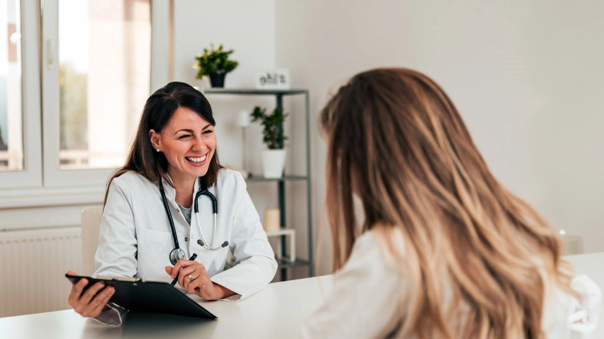 Smiling Doctor to a patient